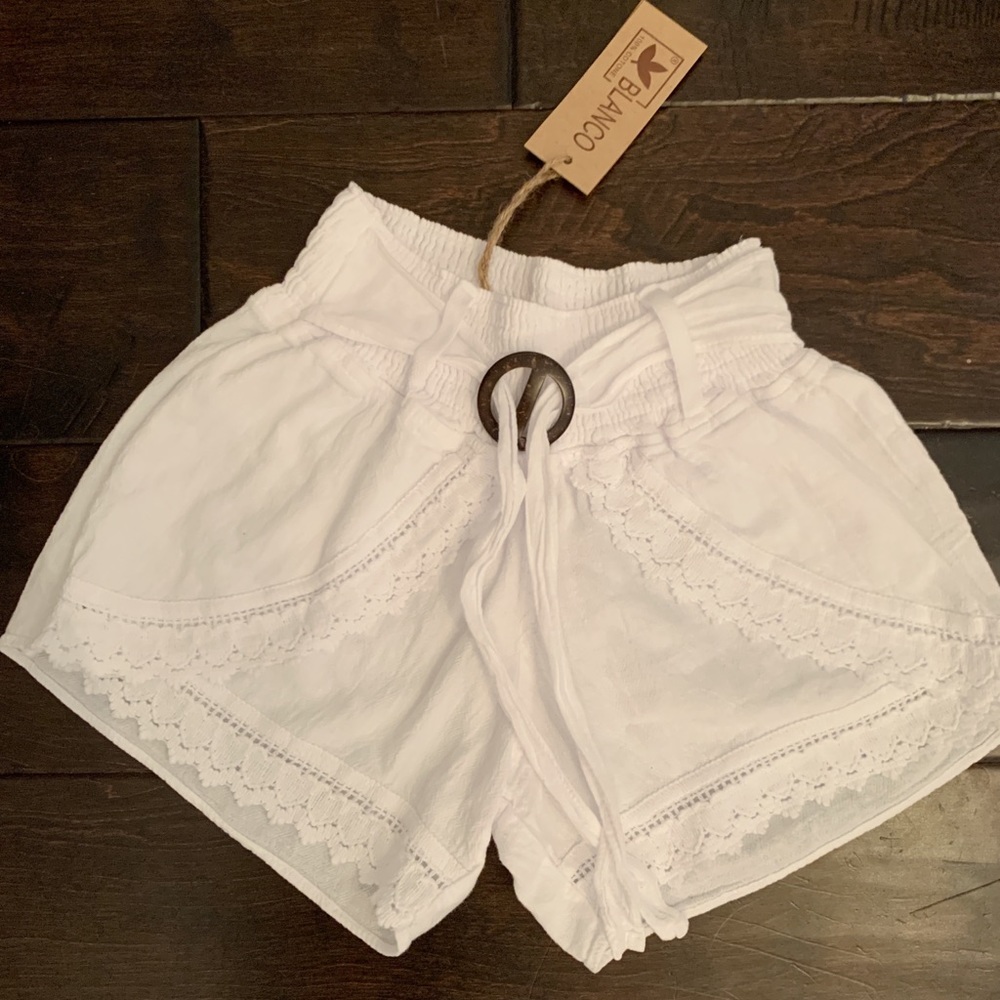white boho shorts. Cute tie in the front.